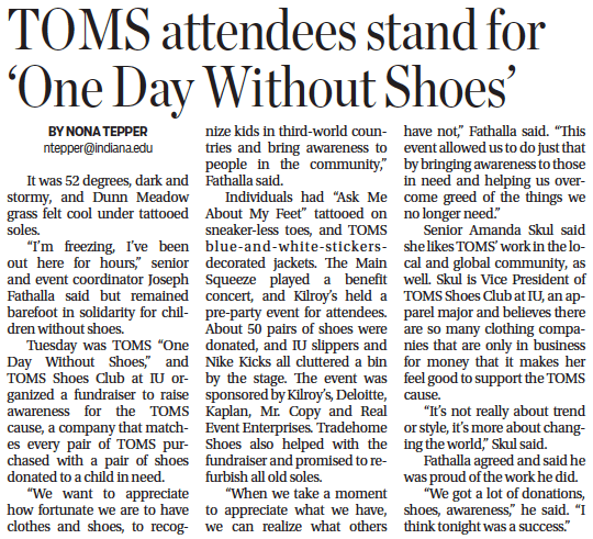 TOMS attendees stand for 'One Day Without Shoes'